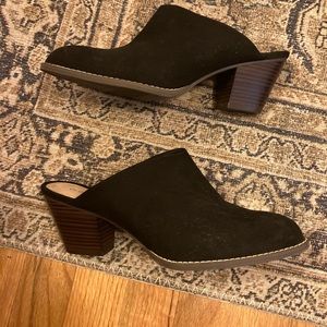 Heeled black suede mules